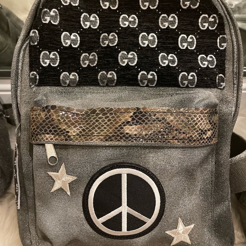 Gorgeous Up-cycled designer handpainted , handmade backpack